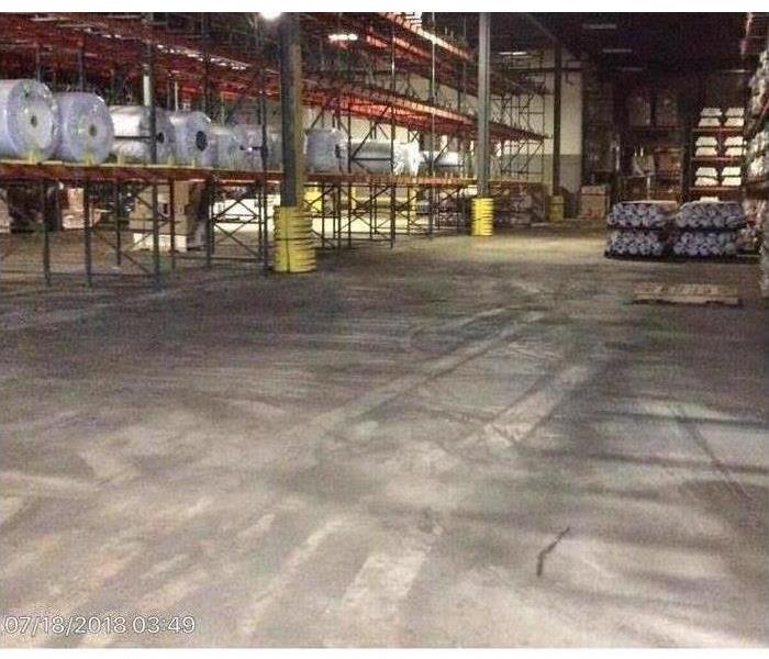 Factory floor dried after flooding.