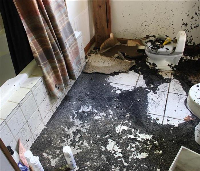 Soot covered bathroom.
